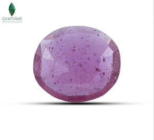 Oval Ruby gemstone with vivid pink hue