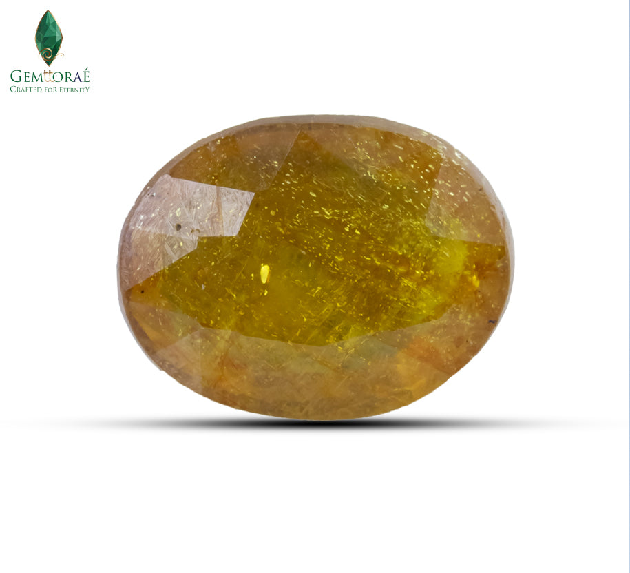 Front view of natural Bangkok Yellow Sapphire with brilliant golden facets