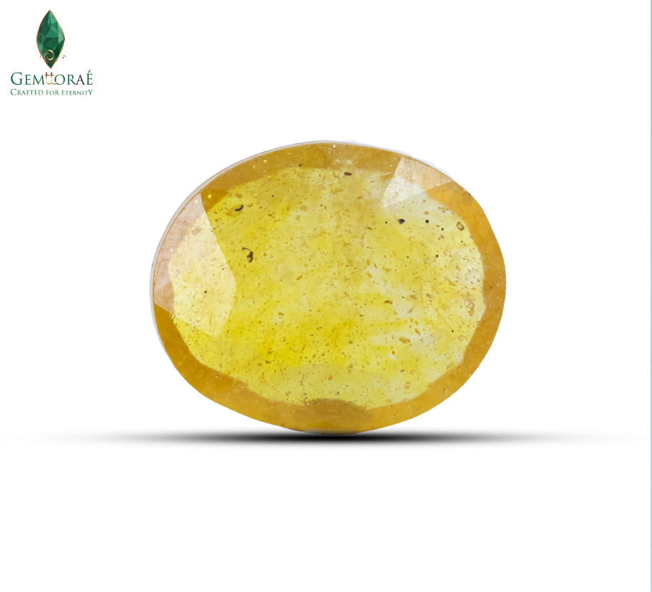 Front view of Bangkok Yellow Sapphire with polished golden facets
