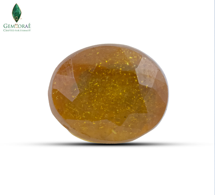 Top view of a Bangkok yellow sapphire with bright golden facets