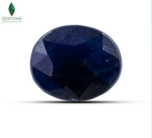 Front view of Blue Sapphire with polished dark blue natural facets