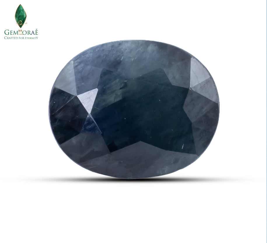 Front view of Dark Blue Sapphire with polished deep blue facets