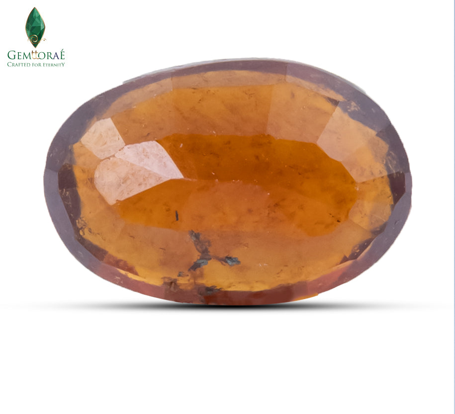 Back view of Garnet Gemstone displaying natural treacle inclusions