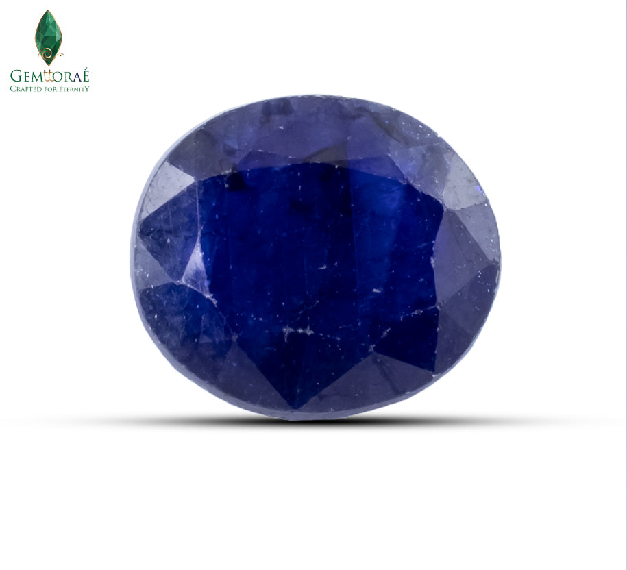 Front view of genuine Neelam Ratna with polished deep blue facets