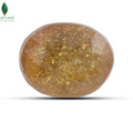Close-up of a natural Bangkok yellow sapphire with golden brilliance