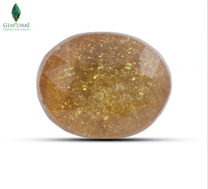Close-up of a natural Bangkok yellow sapphire with golden brilliance