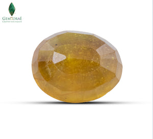 Close-up of a natural Pukhraj stone with glass filled clarity enhancement