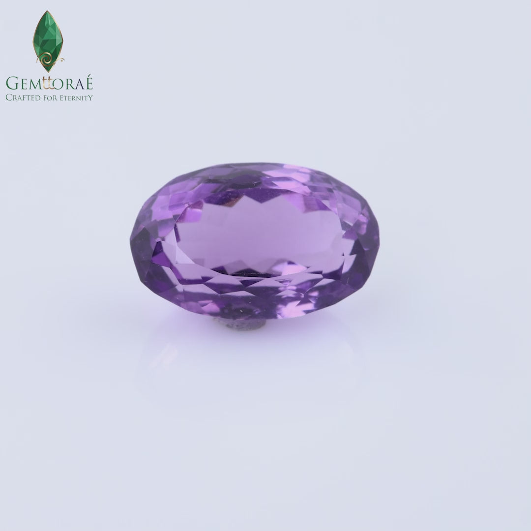 Video of Amethyst Crystal in rotating gemstone showcase