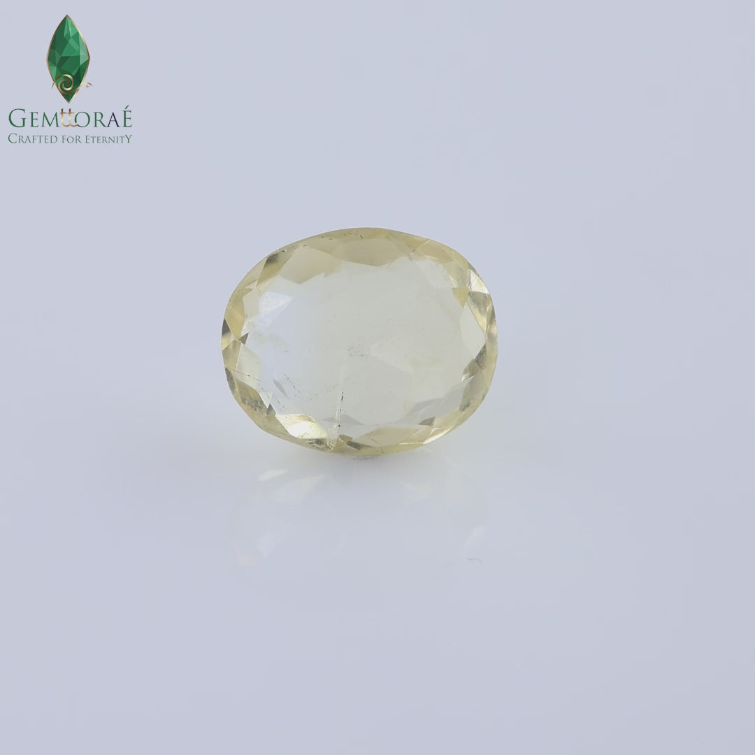 360-degree rotating Citrine Gem with balanced studio illumination