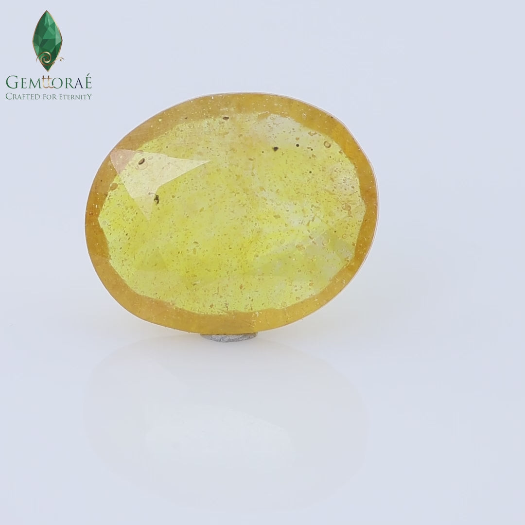 Video of Bangkok Yellow Sapphire displaying brilliant golden colour