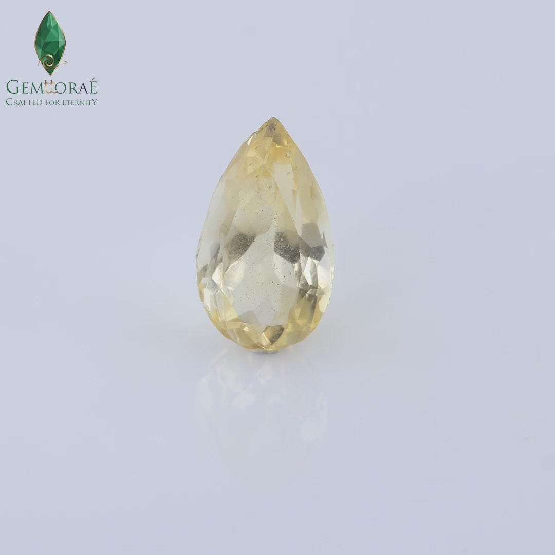 Rotating display video of certified Citrine Gem under studio lighting