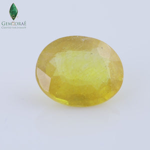 Yellow Sapphire gemstone displaying a warm golden