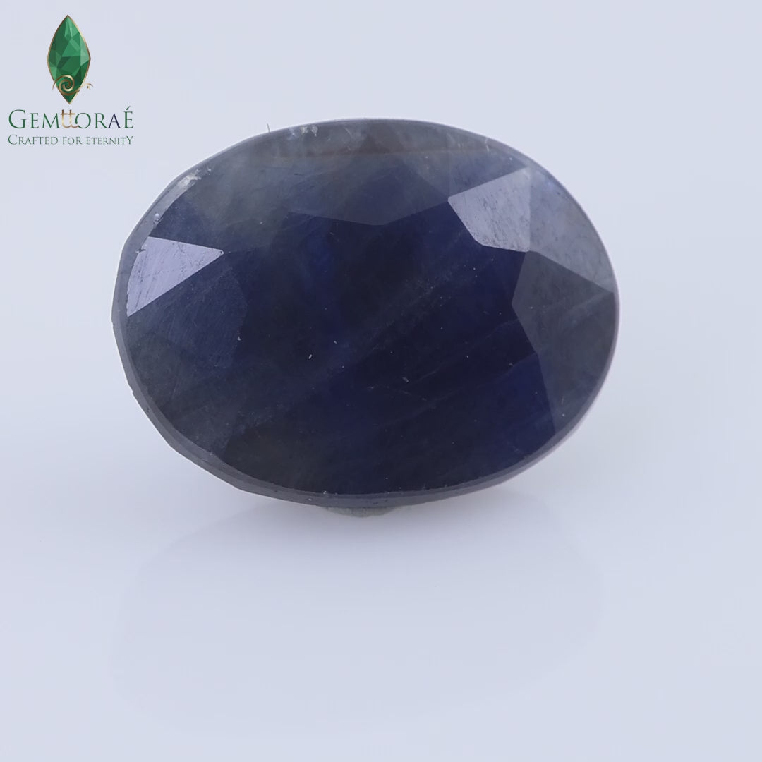 Video of Natural Thailand Dark Blue Sapphire under rotating light
